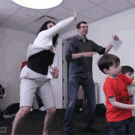 Family playing Kinect