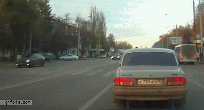 1321903408_pedestrian_almost_hit_by_a_car.gif