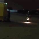 Biker closes tailgate with stoppie