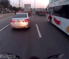 http://www.gifbin.com/bin/112014/1416939167_crashing_biker_almost_run_over_by_truck.gif