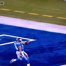 Giants player celebrates by throwing ball at guy's face