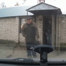 Guy gets wiped out by running dogs