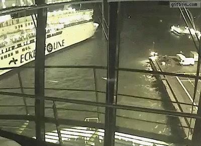 Tugboat assisting larger ship