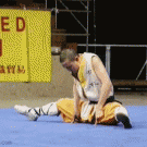 Shaolin monk balances on 2 fingers