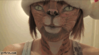 1325608415_girl_with_creepy_cat_face.gif