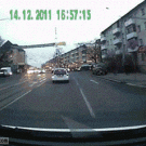 Car almost hits woman with kid on crosswalk