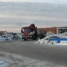 Truck drifts into garage