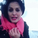 Girl takes selfie with ocean