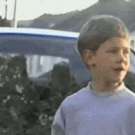 Kid gets a ball to his face