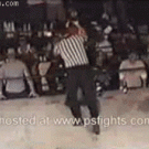 Referee beats boxers in the ring