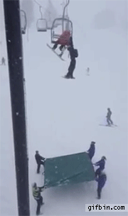 skier falls off chair lift