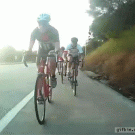 Cyclist gets something caught in his front wheel