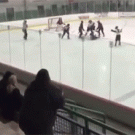 Angry dad reacts at kids' hockey fight