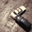 Red: Bruce Willis gets out of spinning car