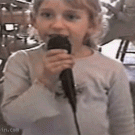 Girl knocks her tooth out with microphone
