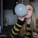 Girl blows smoke soap bubble