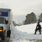 Snowboard flip on a moving truck