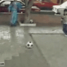 Kid stone soccer ball kick prank