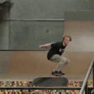 Skateboarder backflips over stairs from one saketeboard to another (Adam Milller)
