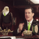Stephen Colbert fistbumps eagle