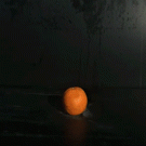 Slow-motion exploding orange