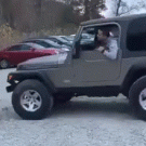 Jeep tries to climb rock