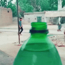 Guy jumps in bottle