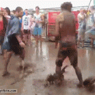 Guy does the worm dance in the mud