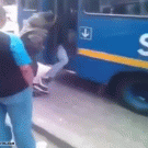 Guy's legs sticking out of bus
