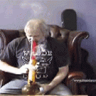 Old dude coughs his guts out while smoking a bong