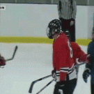 Hockey player gets hit in the head 