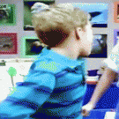 Kid on Barney and Friends simulates brushing teeth