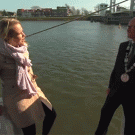 Reporter falls into water during interview