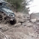 Driver exits crashing jeep like a boss