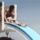 Dad tosses kid in swimming pool on slide ride