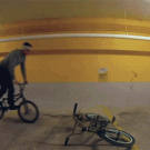 Tim Knoll exchanging bikes