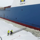 Man gets onto moving cargo ship