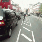 Bicyclist gets squeezed between bus and truck