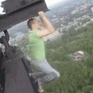 Russian guy hanging from tower stunt