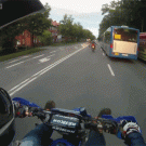Biker low-fives bus driver