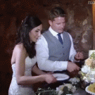 Bride catches cake