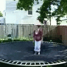 Pregnant woman trampoline back flip
