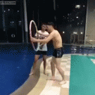 Swimming pool jump through hoop prank