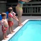 Kids imitate woman jumping in pool