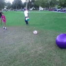 Kid gets hit in the face with excercise ball