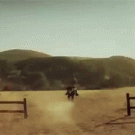 Cowboy hits The End sign while riding horse - Geico commercial