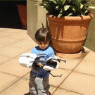 Kid playing with real-life Portal gun (Action Movie Kid)