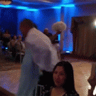 Groomasman backflips into bride at wedding