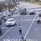 Man dodges truck with style