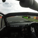 Racer turns opponent's side mirror